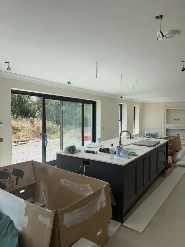 Open plan kitchen and living space decorated in Cork
