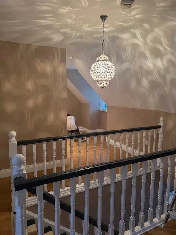 Finished staircase and landing after repair and repaint in a Cork home