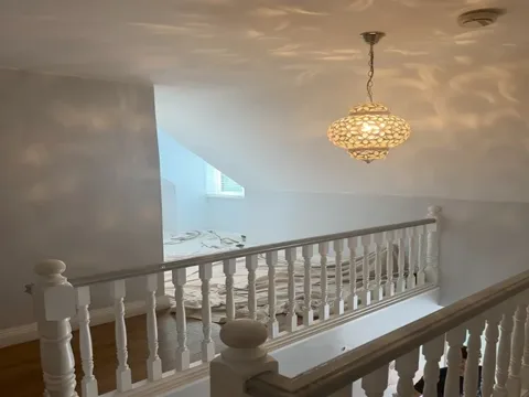 Freshly decorated staircase with panelling in a Cork home